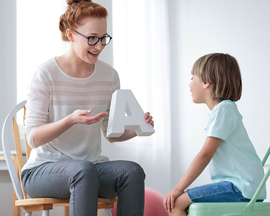 Woman and Child with the Letter A